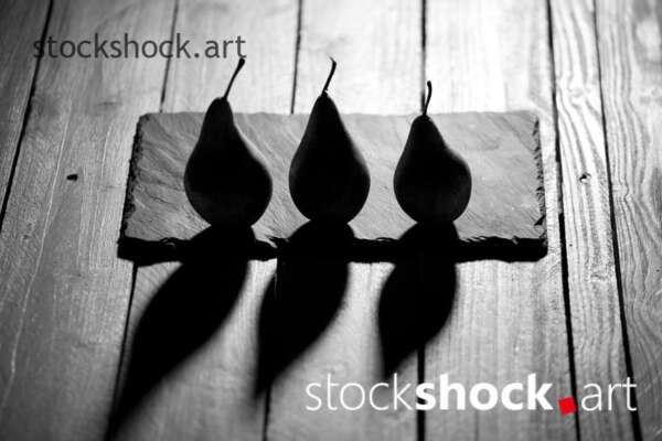 Pears on a black background, black&white, stock image