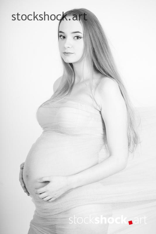 Romantic photo of a young pregnant woman