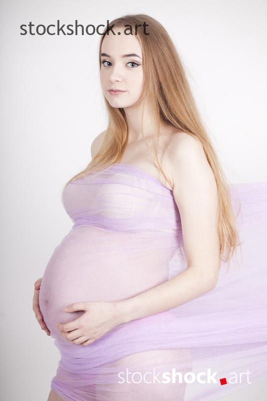 Romantic photo of a young pregnant woman