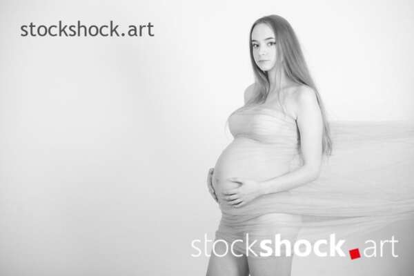 Romantic photo of a young pregnant woman