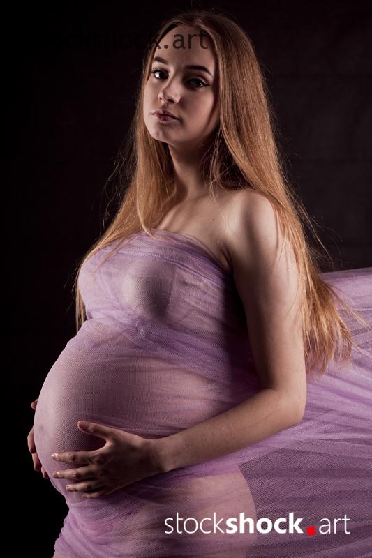 Romantic photo of a young pregnant woman