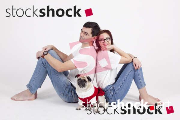 Family with a pug, stock image, jowita niemczyk