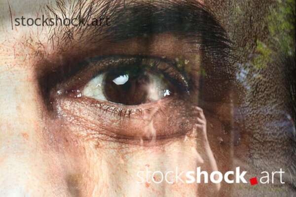 Close-up of the man's eye in the poster