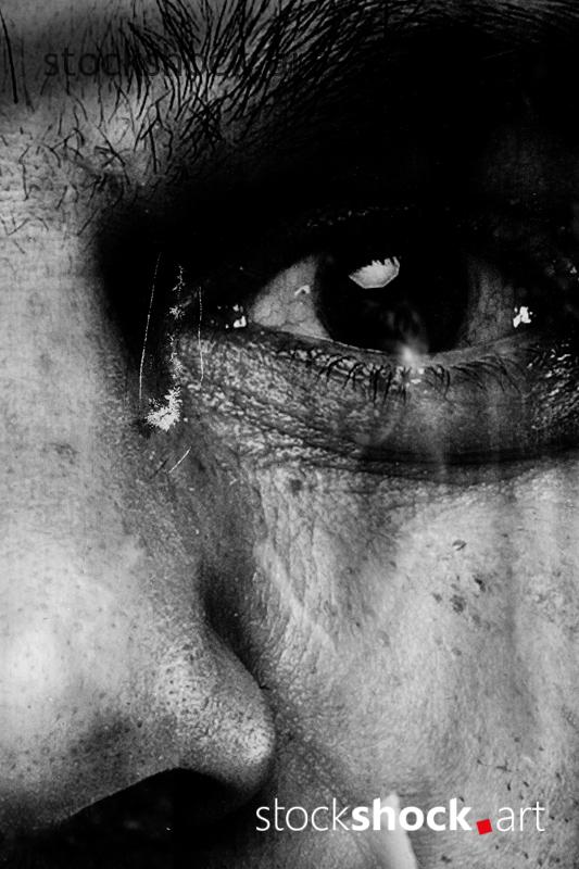 Close-up of the man's eye in the poster