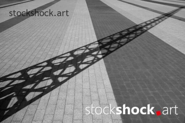Shadow on the street, black and white - stock image