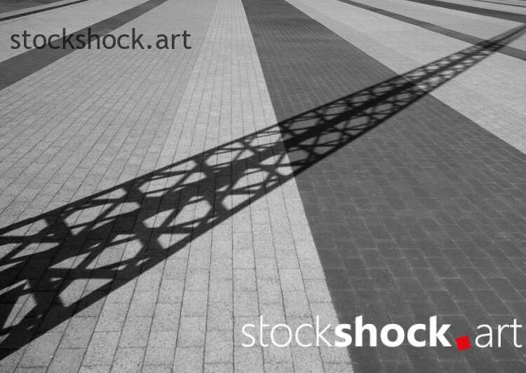 Shadow on the street, black and white - stock image