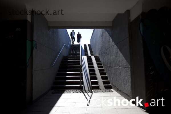 Shadow of people in underpass, stairs, black and white, black and white, stock image