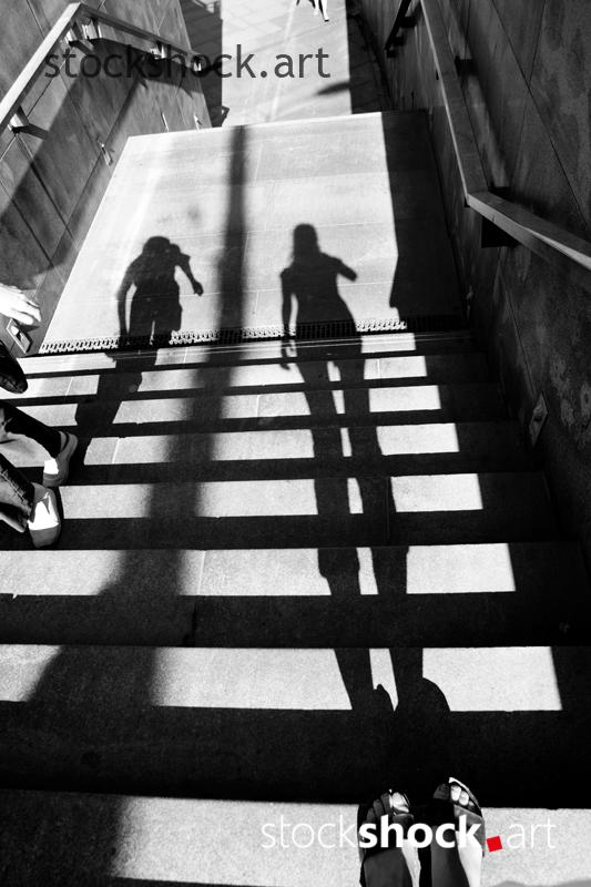 Shadow of people in the city, black and white, stock image