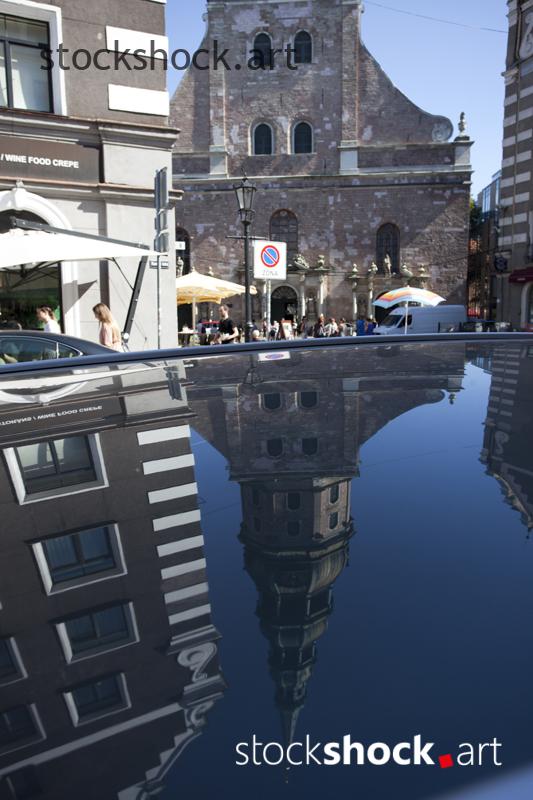 Riga, Latvia. Reflection in the mirror. Church of St. Peter. Centrum, architecture, stock image