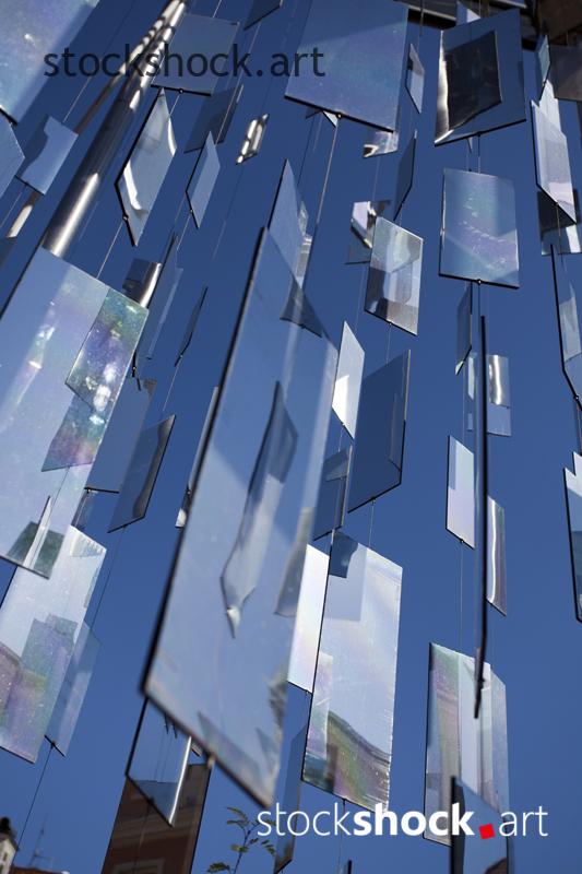 Installation of small mirrors in Riga. blue, stock image