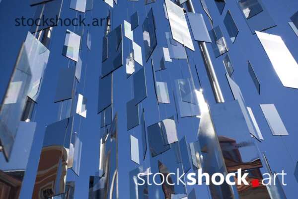 Installation of small mirrors in Riga. blue, stock image