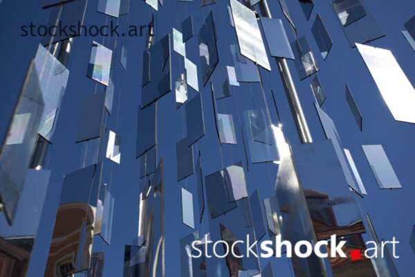 Installation of small mirrors in Riga. blue, stock image