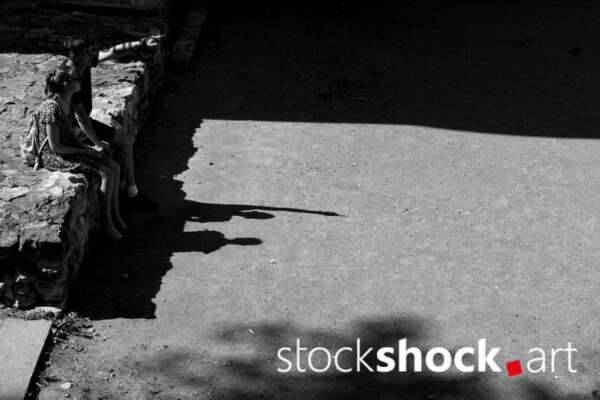 Shadow on the street, black and white - stock image