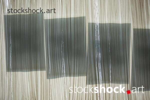 Abstract shadows on the glass, white, beige, gray,stock image