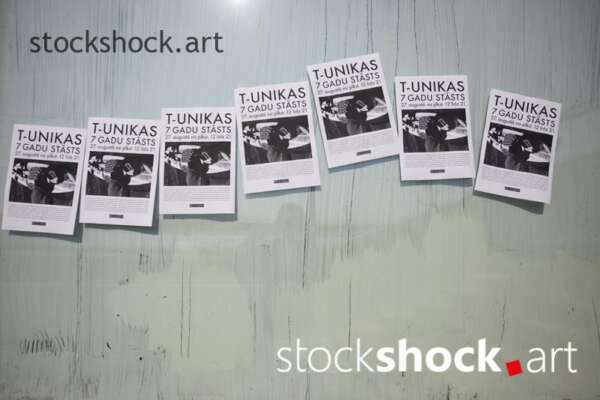 Posters on the window, Latvia, stock image