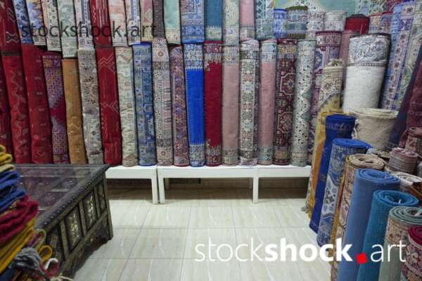 Moroccan rugs in the store, stock image