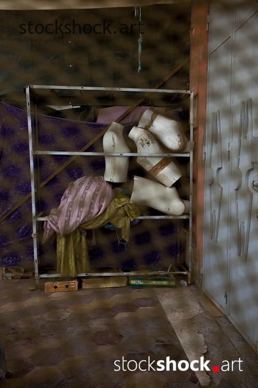 Mannequin busts stored in the back of the store