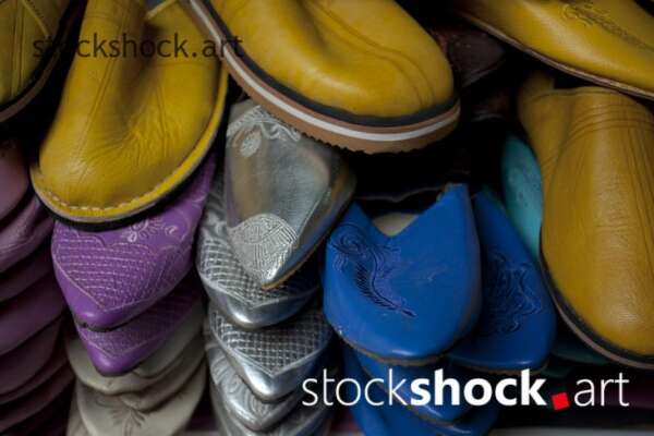 A stall selling colorful leather shoes in Morocco