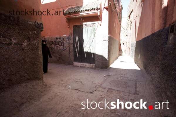 A woman walking through the streets of Marrakech