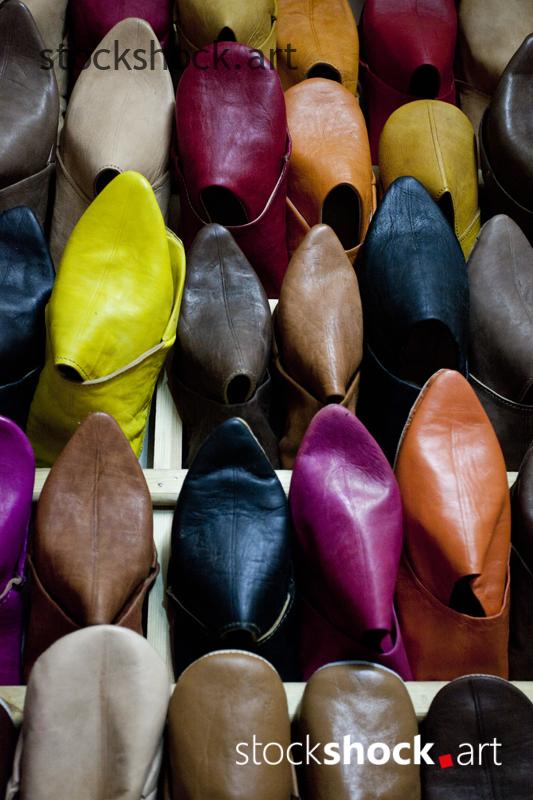 Moroccan colorful shoes in the store - stock image