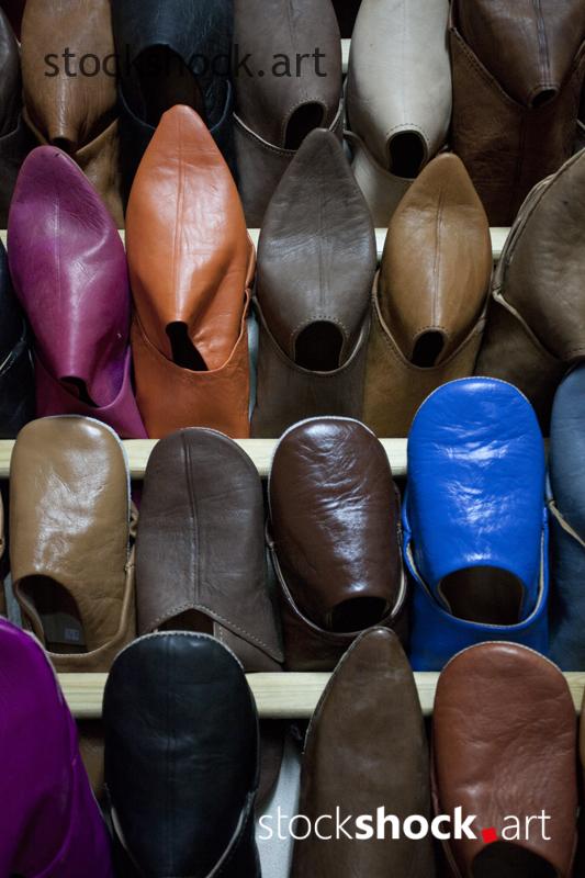 Moroccan colorful shoes in the store - stock image