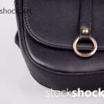 Black bag fastened at the waist