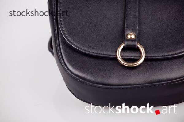 Black bag fastened at the waist