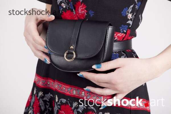 Black bag fastened at the waist