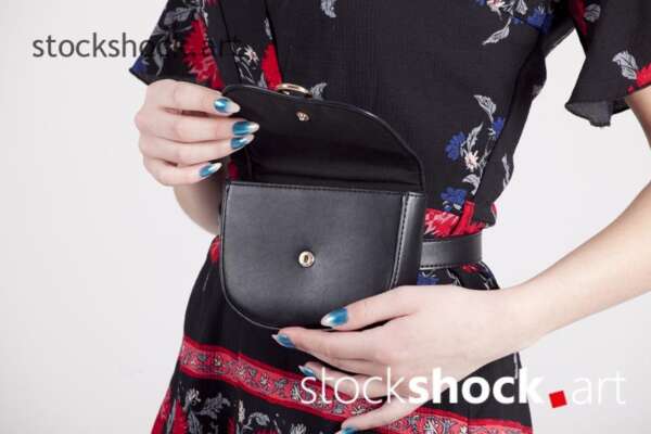 Black bag fastened at the waist