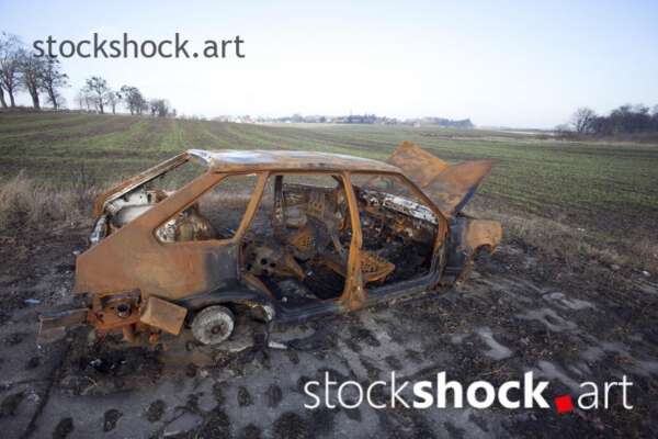 Old, burnt car, rust