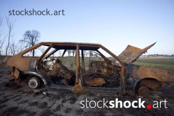 Old, burnt car, rust