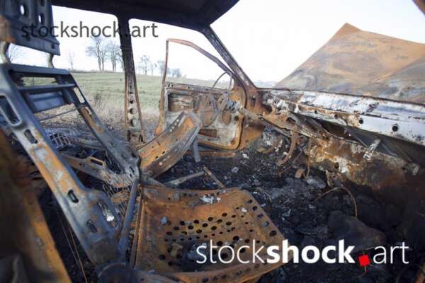 Old, burnt car, rust