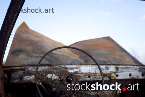 Old, burnt car, rust