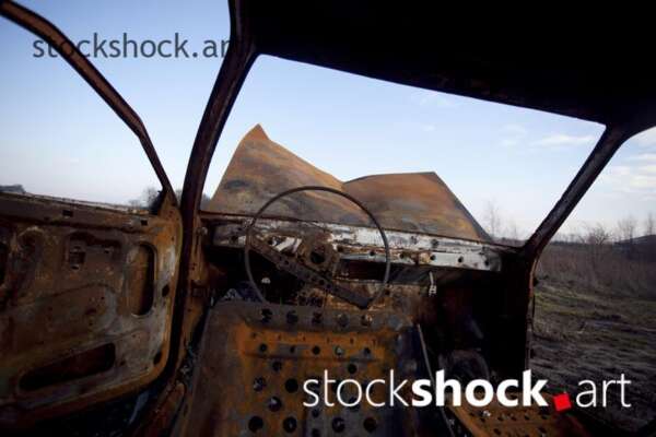 Old, burnt car, rust