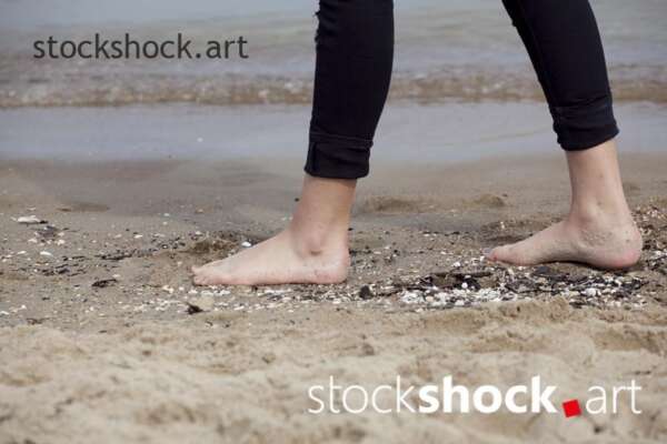 bare feet on the sand