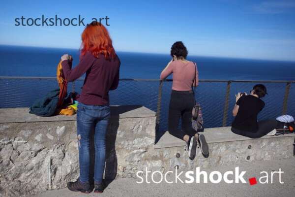 Majorca, tourists at the viewpoint of the Mediterranean Sea, stock image