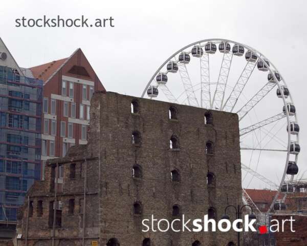 Gdańsk, Poland. Ferris wheel against the background of an old granary - stock image (Copy)