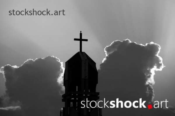 Church against the background of clouds with glow