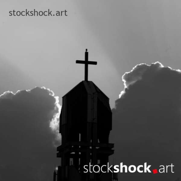 Church against the background of clouds with glow