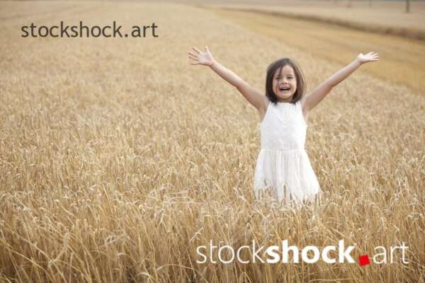 The end of the harvest. A joyful girl in barley - stock photo, jowita niemczyk, stockshock.art